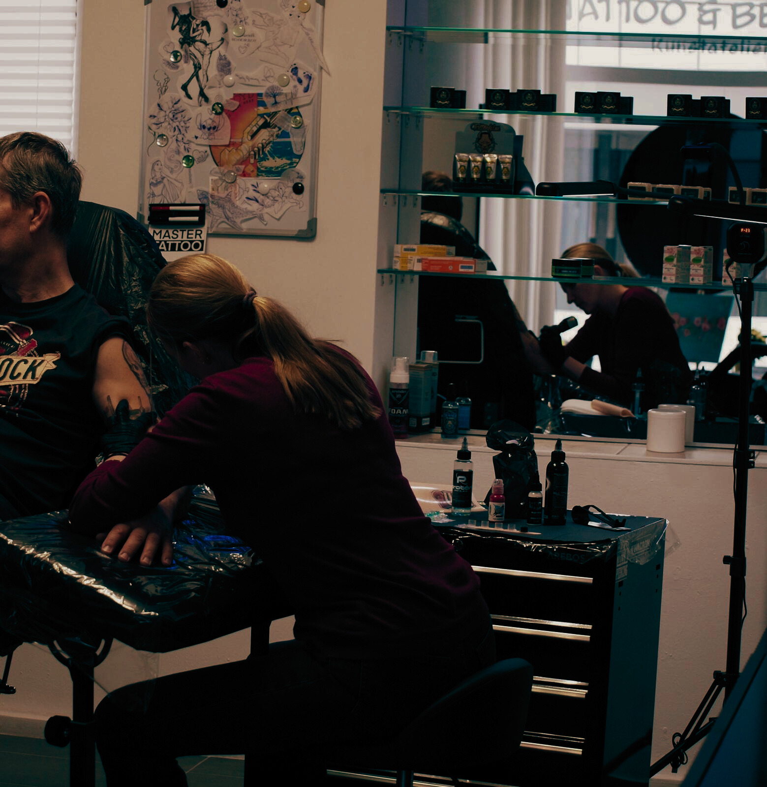 Professional tattoo artist at work